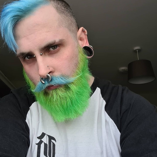 Dyed beard and curled mustache